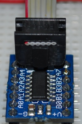 The read mark in lined up with the mark in the connector socket on the board.